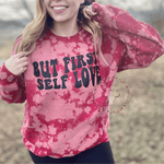 Load image into Gallery viewer, Midsize influencer outdoors wearing a Valentine&#39;s Day Inspired But First Self Love Acid Washed Vintage Bleached Crewneck Sweatshirt 
