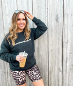 Load image into Gallery viewer, midsize influencer wearing black crewneck sweatshirt with I&#39;m a better person when i&#39;m tan and holding an iced coffee design in white letters
